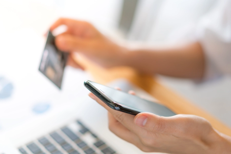 Customer completing a secure mobile payment with a credit card